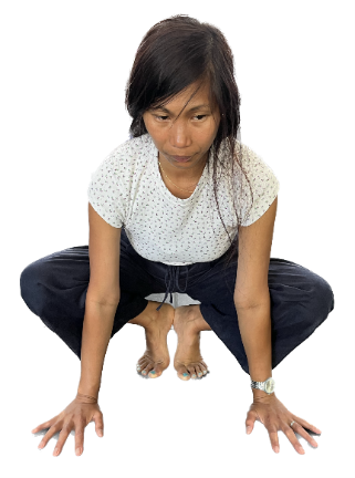 Photograph of woman in the Relaxed Frog position